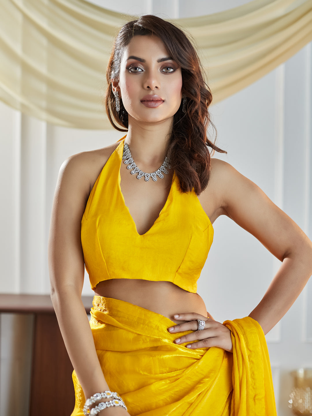 Dhiyona KS Women's women yellow solid silk saree