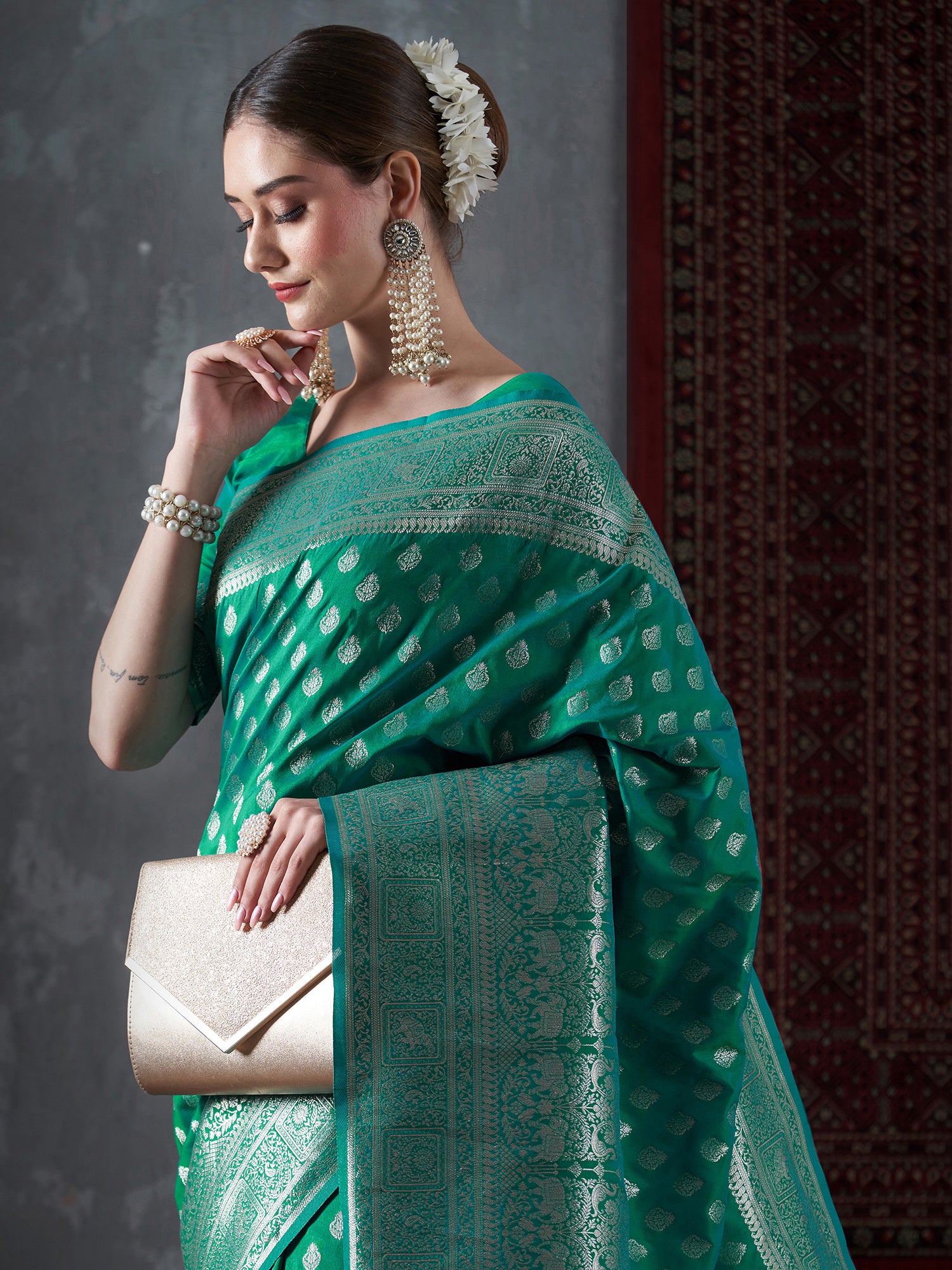 Women's Silk Blend Sea Green Woven Design Designer Saree With Blouse Piece