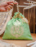 Dhiyona NR Ethnic Motic Embroidered Potli Clutch