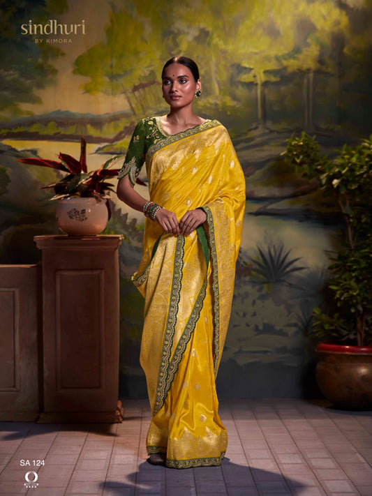 Dhiyona KM Women Yellow Pure Dola Silk Saree With Contrasting Green Embroidered Blousee