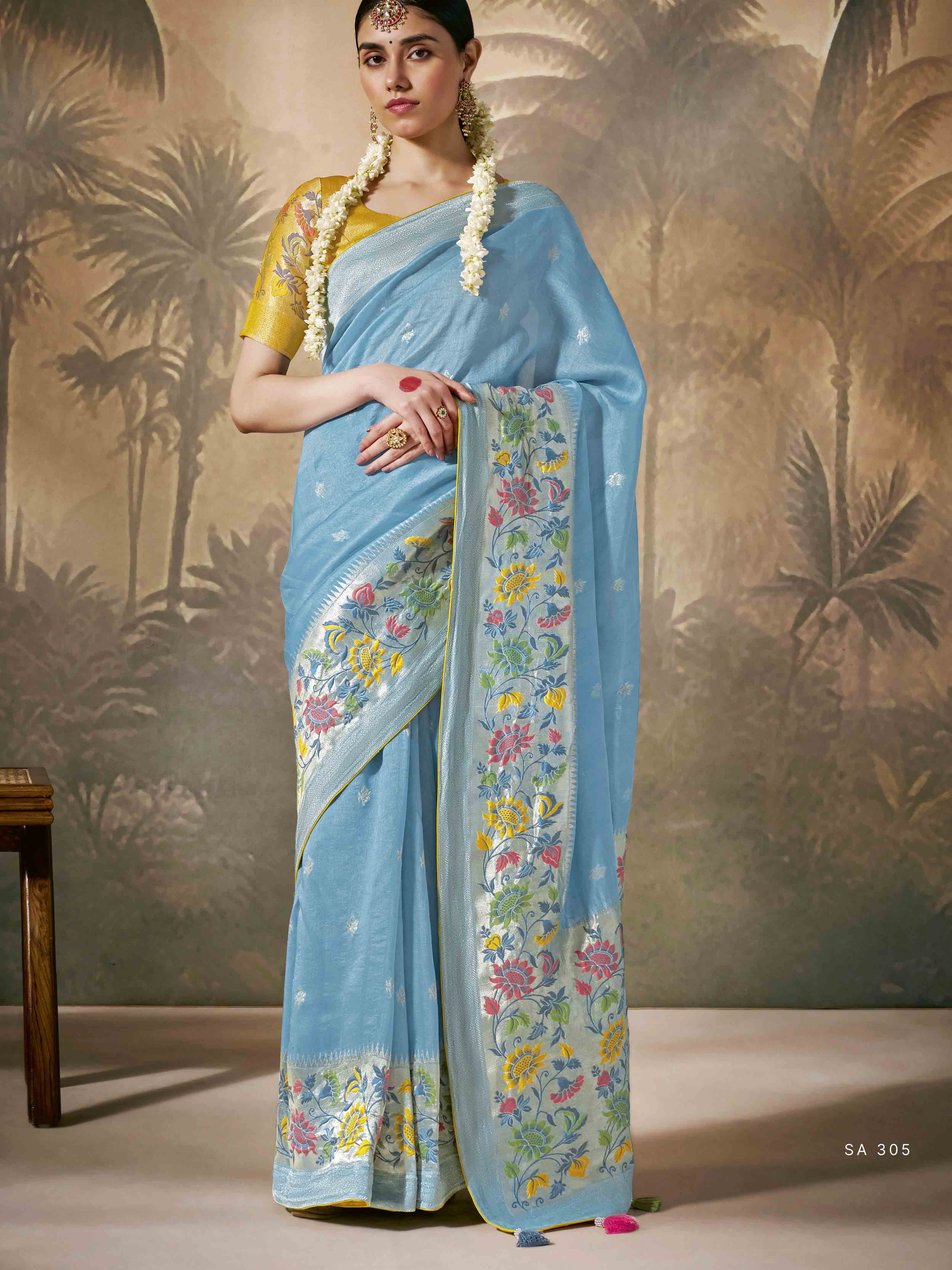Dhiyona KM Women Elegant Sky Blue Saree With Yellow Contrast Blouse