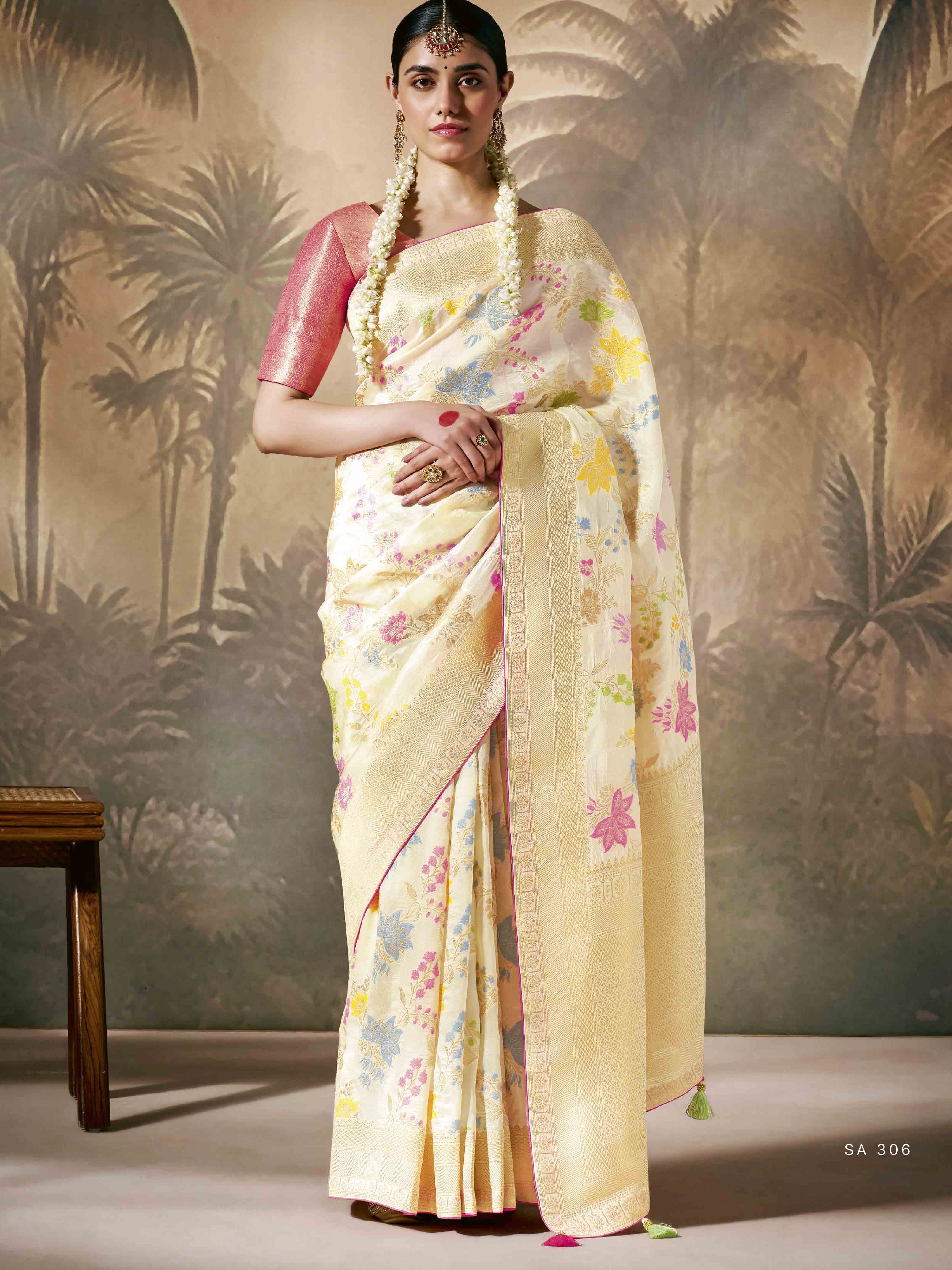 Dhiyona KM Women Elegant White Saree With Multi-Color Floral Embroidery