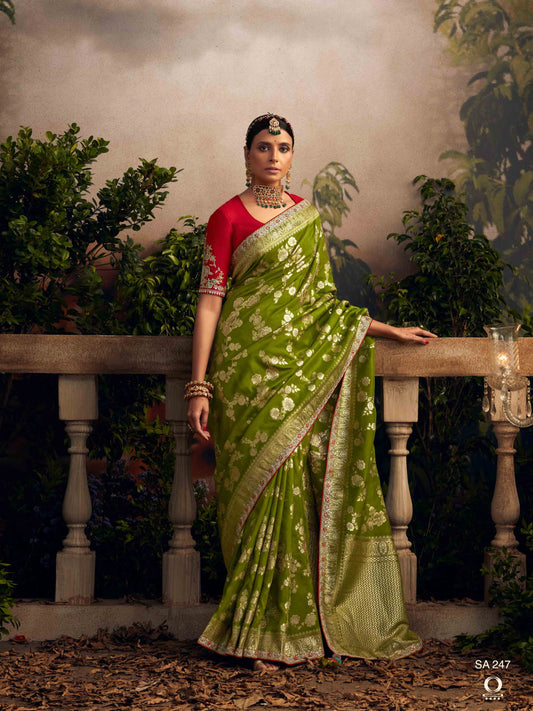 Dhiyona KM Women Glamorous Green Zari Woven Dola Silk Wedding Saree With Red Blouse