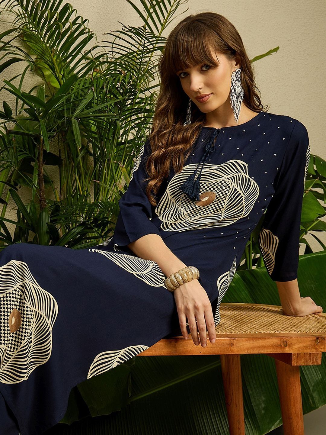 Women Printed Regular Kurta with Trousers