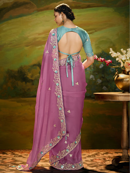 Dhiyona KM Women The Pink Silk Saree With Teal Blouse