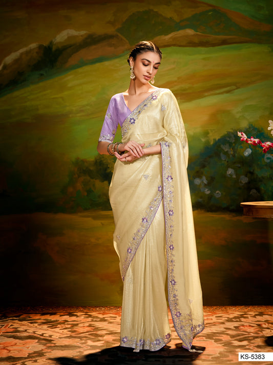 Dhiyona KM Women Pastel Yellow Saree With Silver Embroidery & Purple Blouse
