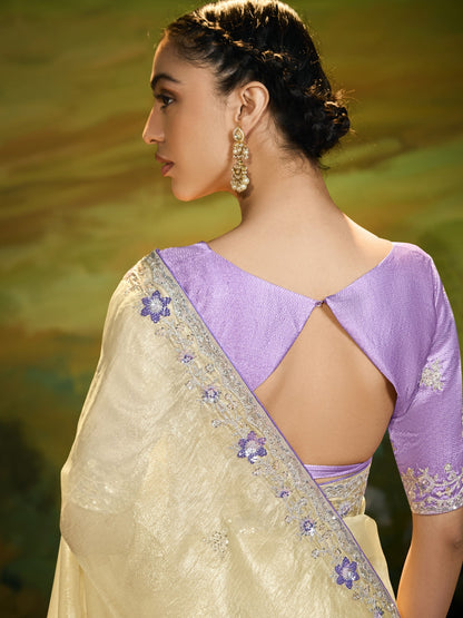 Dhiyona KM Women Pastel Yellow Saree With Silver Embroidery & Purple Blouse