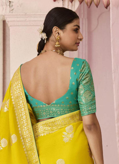 Dhiyona KM Women Yellow Dola Silk Saree With Sea Green Golden Embroidered Blouse