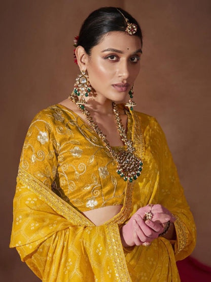Women's Chiffon Yellow Embellished Designer Saree With Blouse Piece