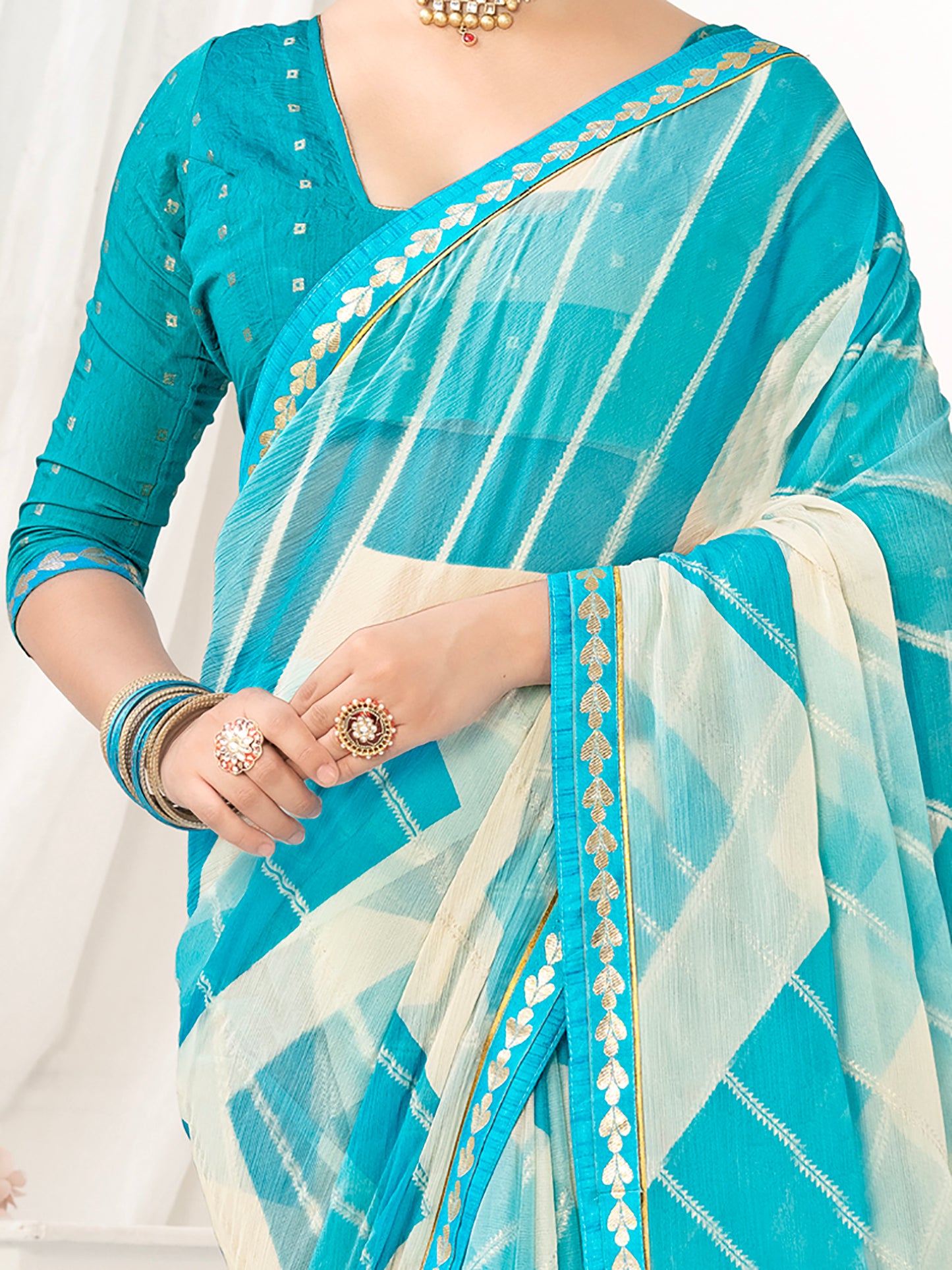 Women's Chiffon Blue Embellished Designer Saree With Blouse Piece