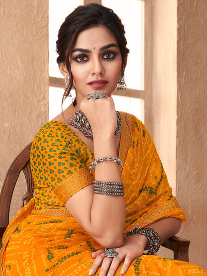Women's Chiffon Yellow Embellished Designer Saree With Blouse Piece