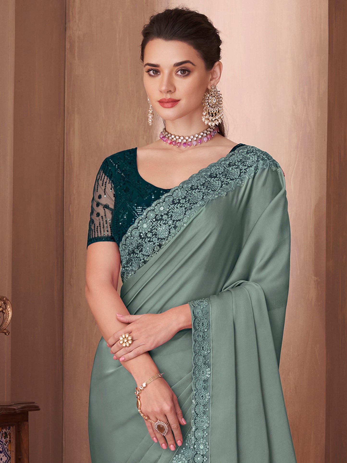 Women's Silk Blend Sea Green Embellished Designer Saree With Blouse Piece