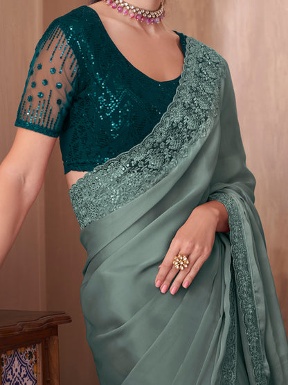 Women's Silk Blend Sea Green Embellished Designer Saree With Blouse Piece
