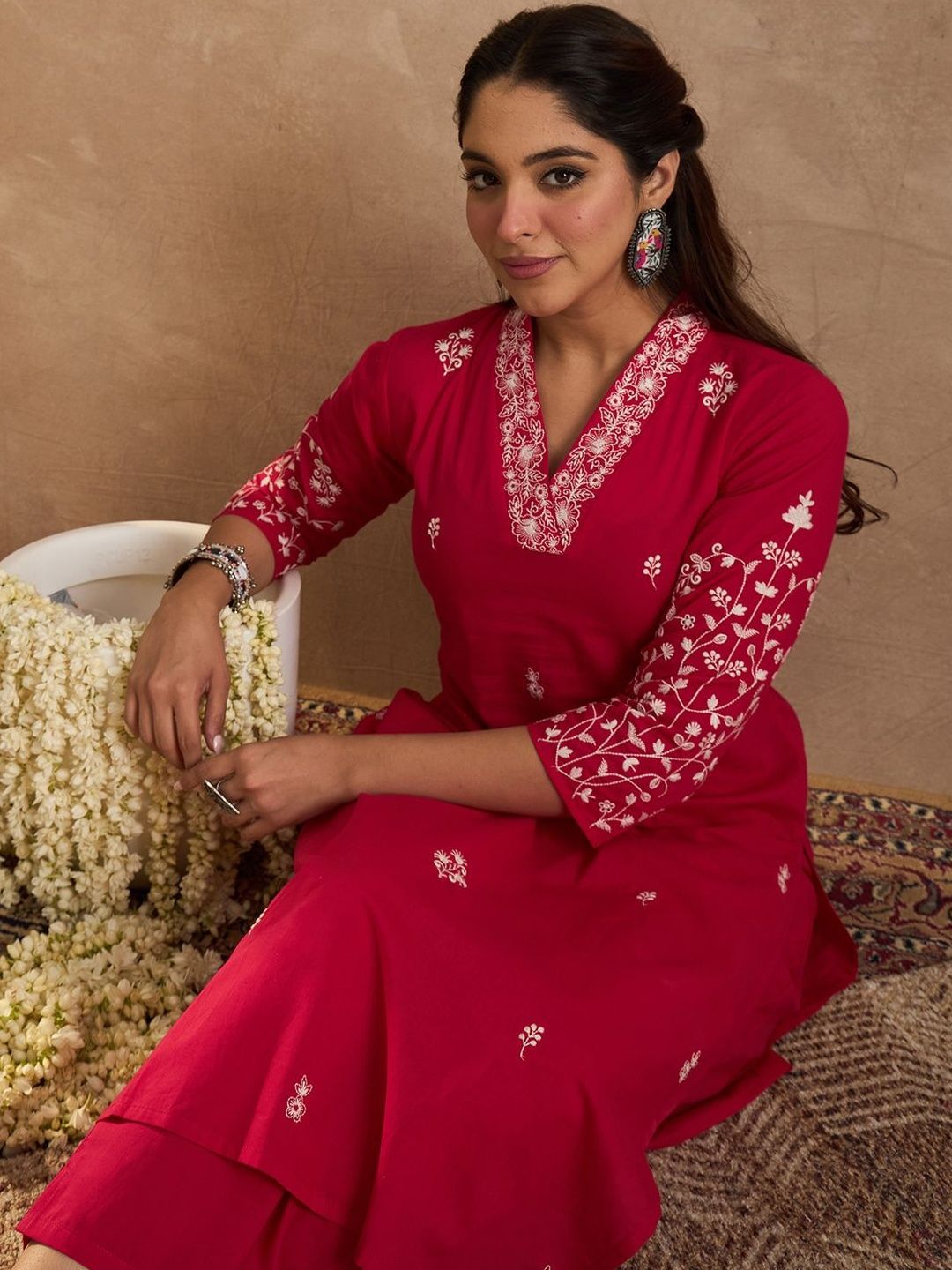 Women Ethnic Motifs Embroidered Cotton Kurta with Trousers