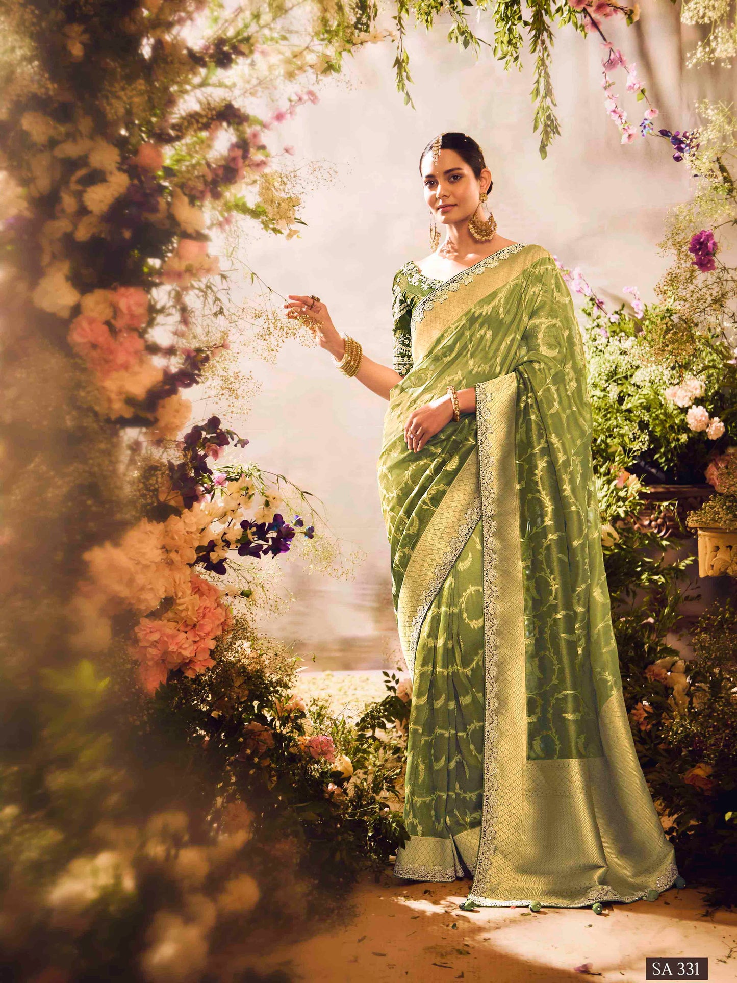 Dhiyona KM Women Green Silk Saree