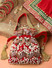 Dhiyona NR Embellished Tasselled Potli Clutch