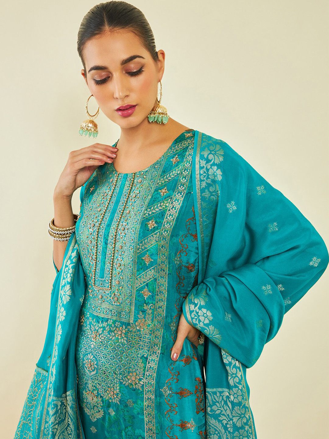 Dhiyona SO Women's Turquoise Blue Floral Printed Regular Beads and Stones Kurta With Trousers & Dupatta