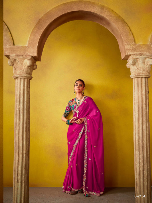 Dhiyona KM Women Regal Magenta Elegance: A Timeless Saree Of Opulence