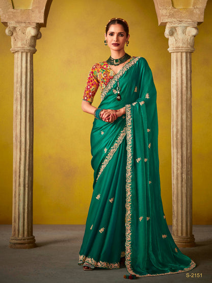 Dhiyona KM Women Emerald Green Saree With A Vibrant Floral Embroidered Blouse