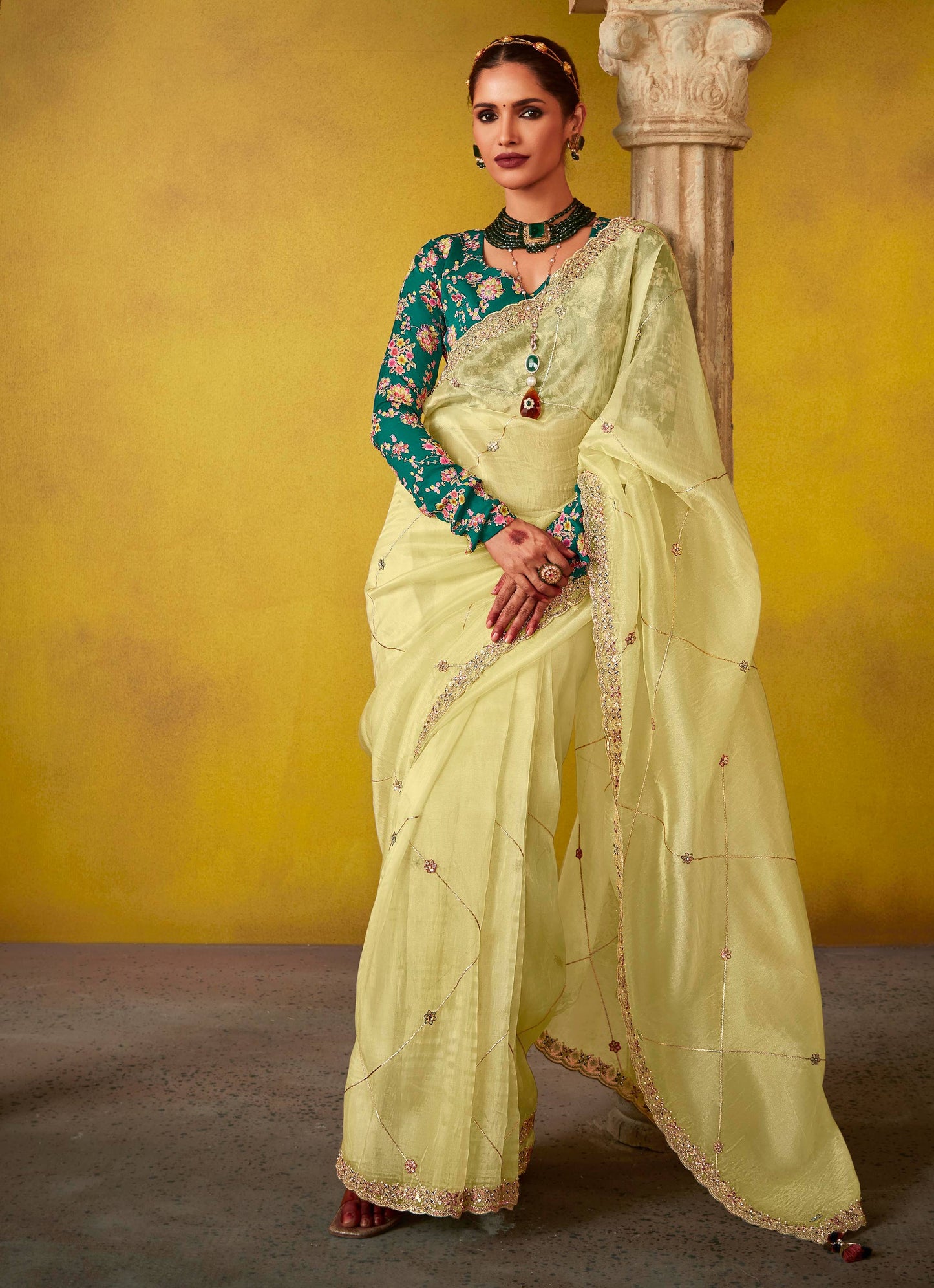 Dhiyona KM Women Lemon Yellow Saree With Embroidered Teal Blouse