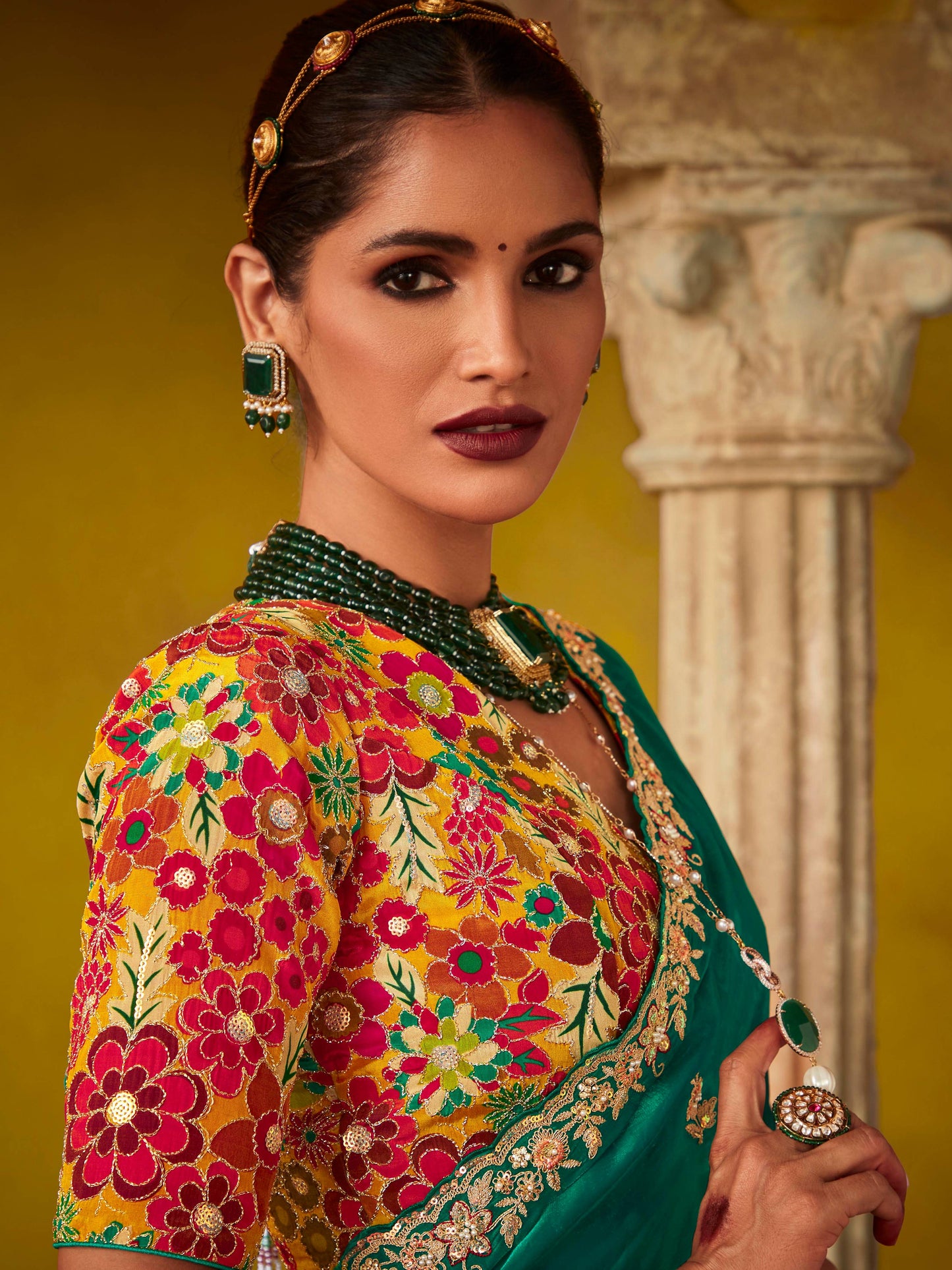 Dhiyona KM Women Emerald Green Saree With A Vibrant Floral Embroidered Blouse