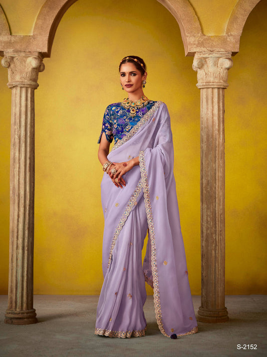 Dhiyona KM Women Ethereal Elegance: Purple Silk Saree With Embroidered Blouse