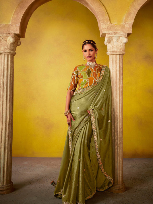 Dhiyona KM Women Olive Green Saree : Heritage And Elegance