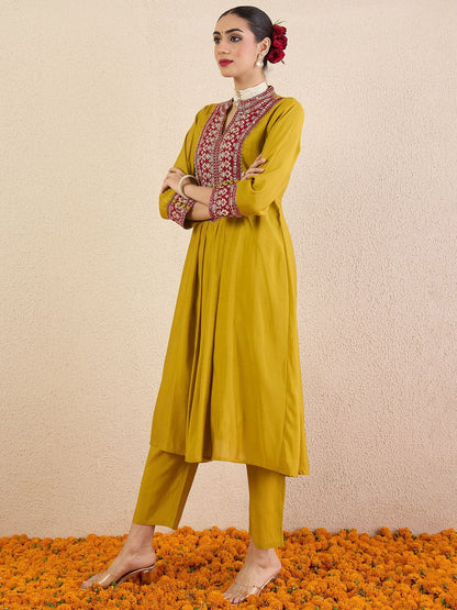 Women Solid Embroidered Kurta with Pyjama