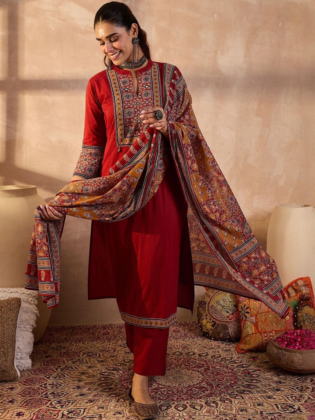 Women Ethnic Motifs Embroidered Cotton Kurta with Trousers