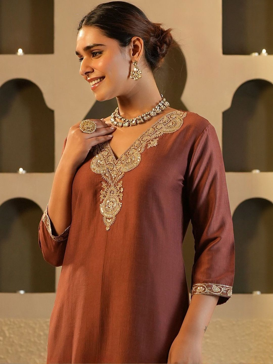 Women Solid Embroidered Kurta with Trousers