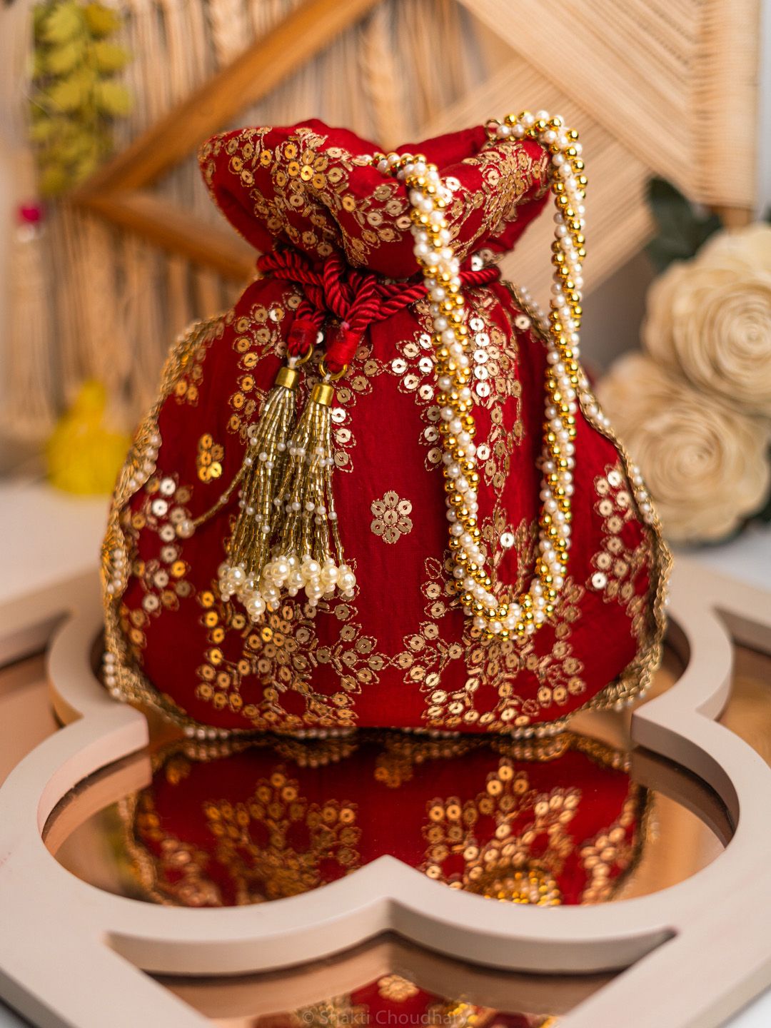 Dhiyona NR Embroidered Potli Clutch