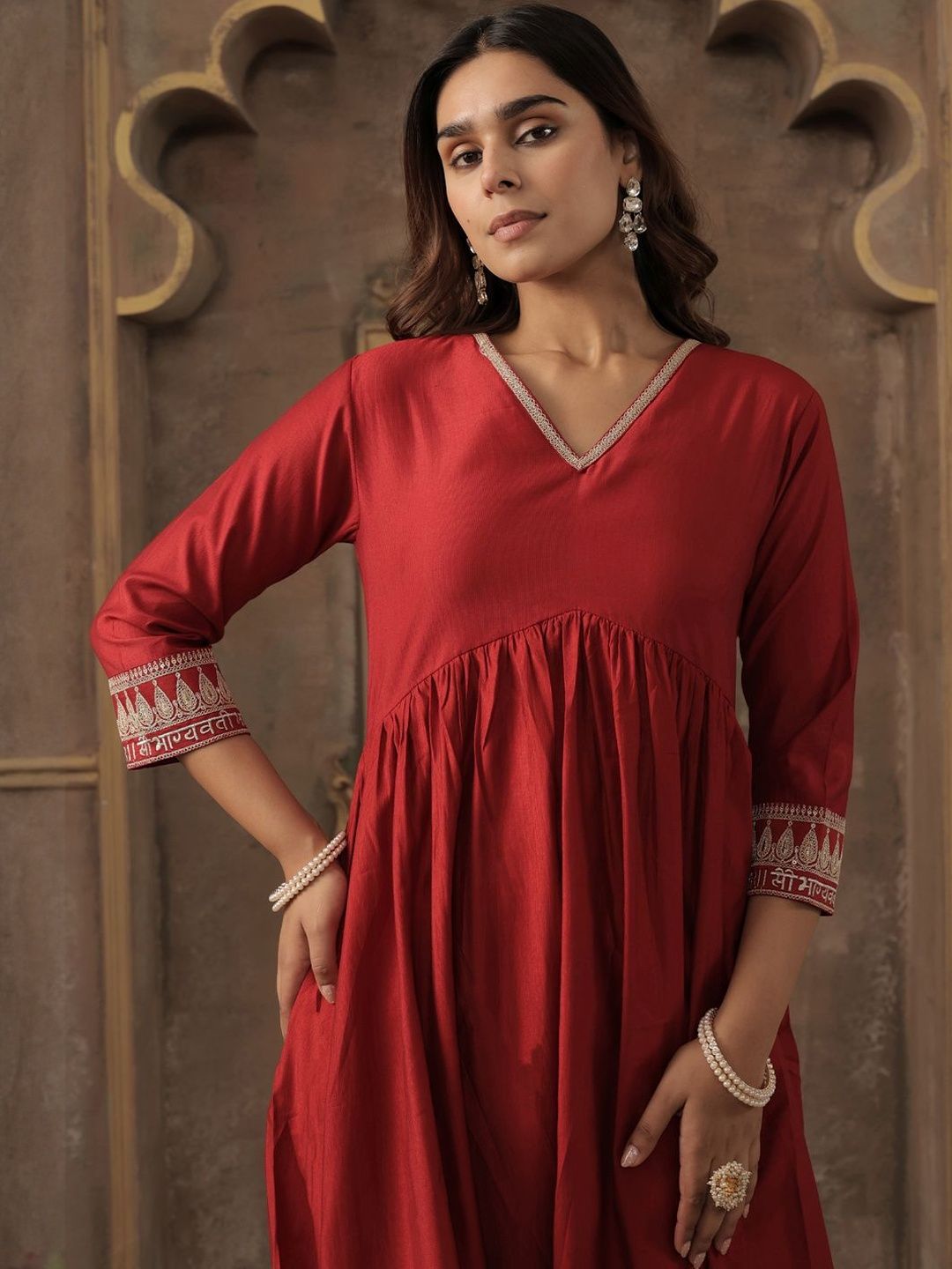 Dhiyona IE Women Solid A-Line Kurta with Trousers