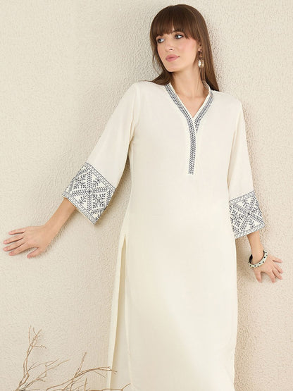 Women Solid Embroidered Kurta with Trousers