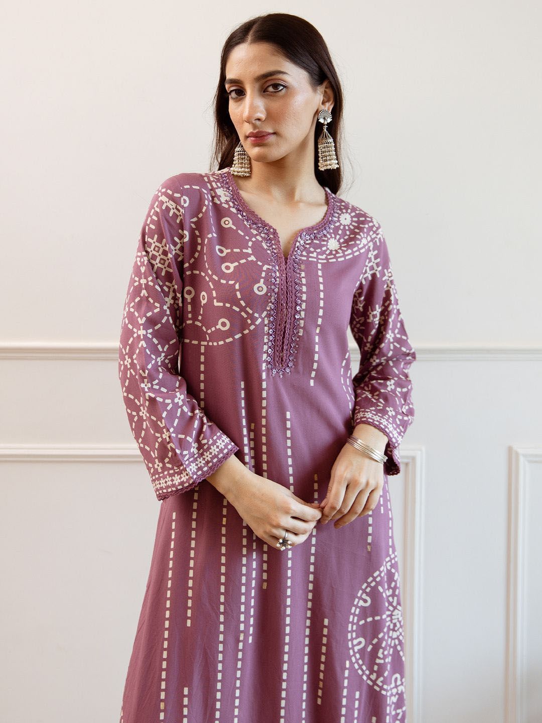 Dhiyona IE Women Printed Regular Beads and Stones Kurta with Trousers