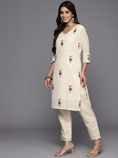Dhiyona IE Women Floral Embroidered Regular Sequinned Kurta with Sharara & With Dupatta