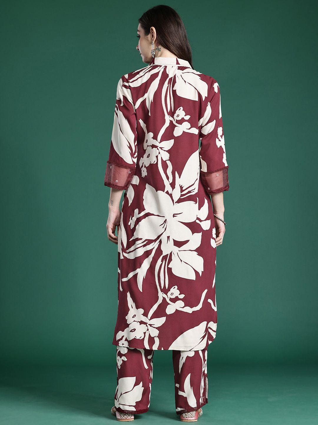 Women Floral Printed Sequinned Kurta with Trousers