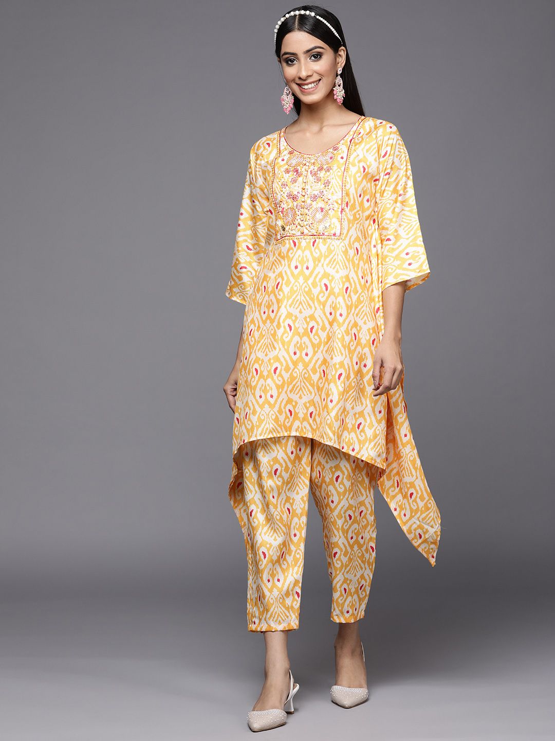 Women Yellow Ethnic Motifs Printed Sequinned Kurta with Trousers