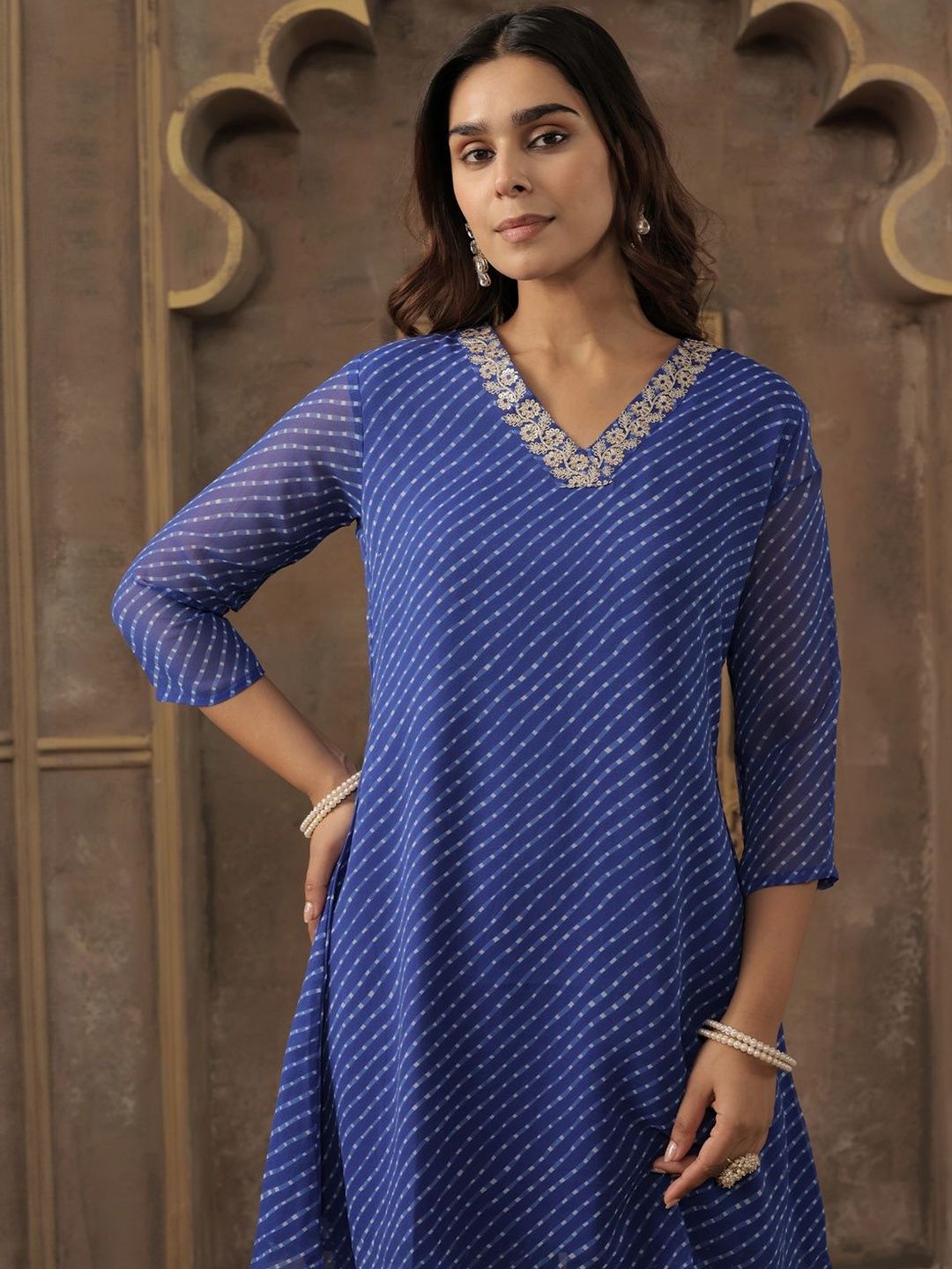 Women Ethnic Motifs Printed Regular Thread Work Kurta with Trousers