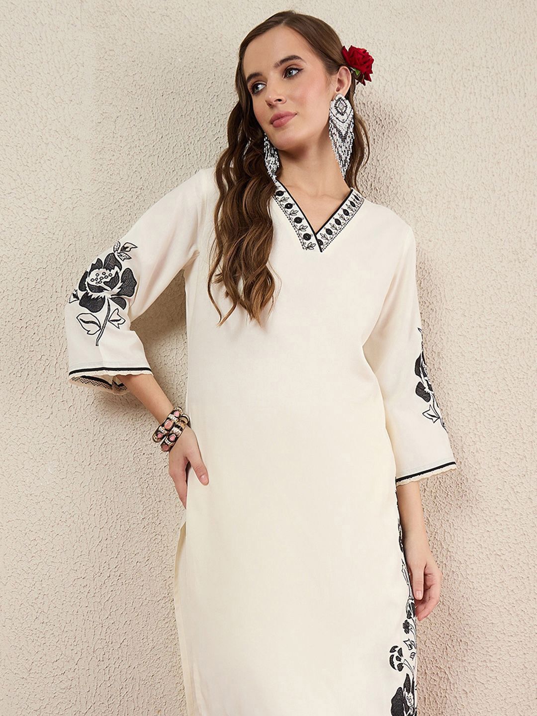 Women Solid Embroidered Kurta with Trousers
