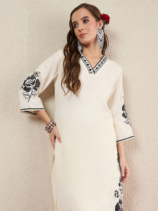 Women Solid Embroidered Kurta with Trousers