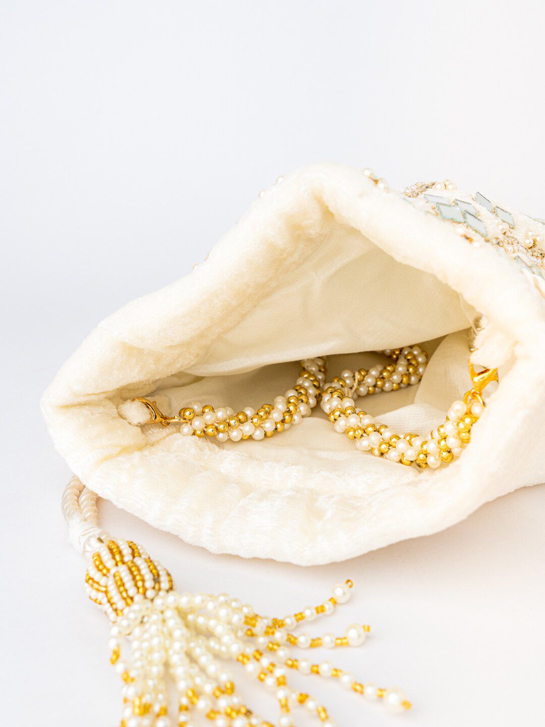 Dhiyona NR White Mirror Work Embroidered Potli Clutch