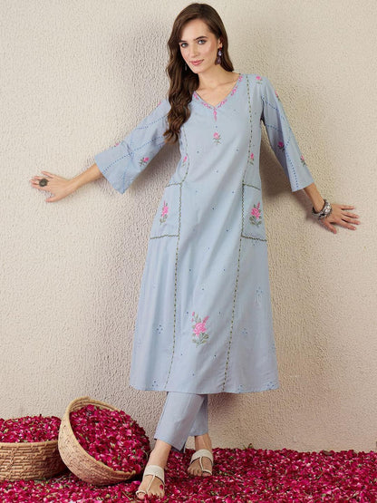 Women Floral Embroidered Cotton Kurta with Trousers