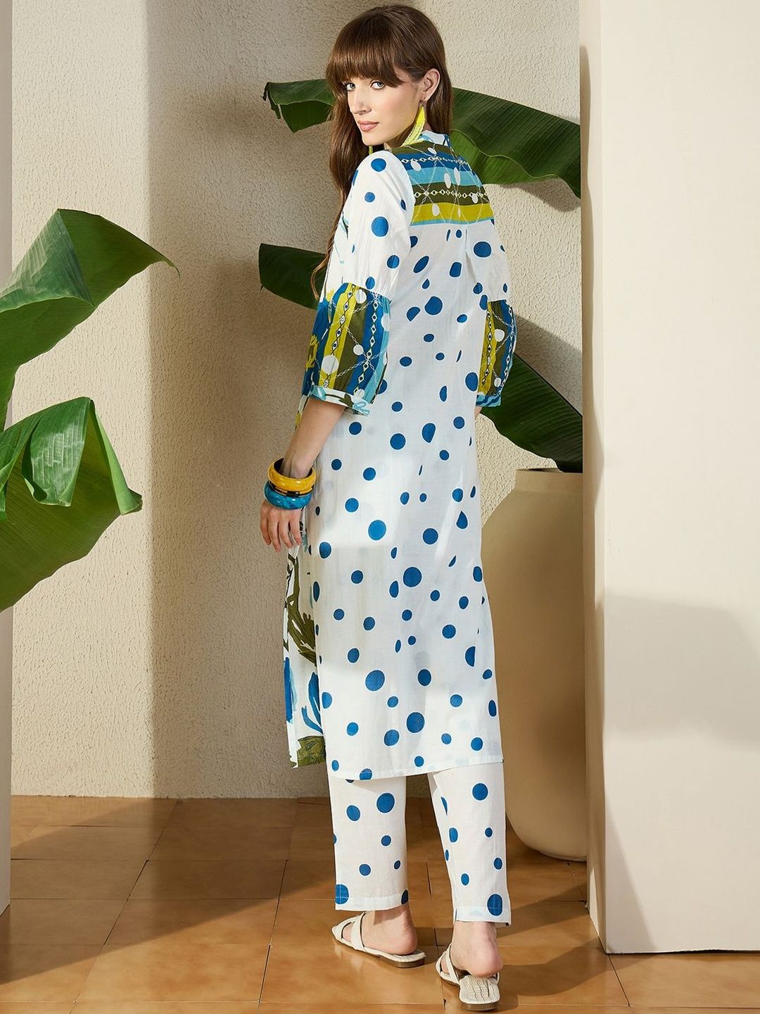 Women Floral Printed Cotton Kurta with Trousers