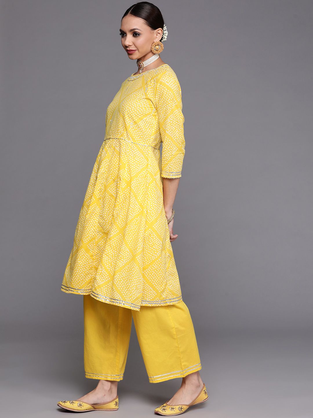 Dhiyona IE Women Yellow Printed Gotta Patti Kurta with Trousers