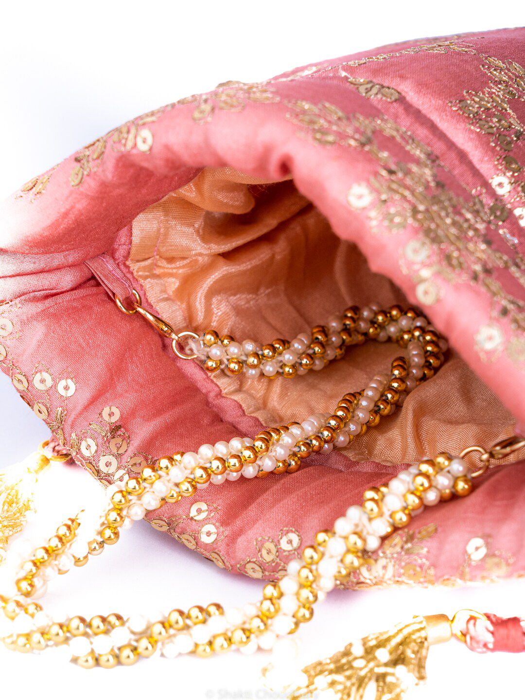 Dhiyona NR Women Pink Embroidered Potli Clutch