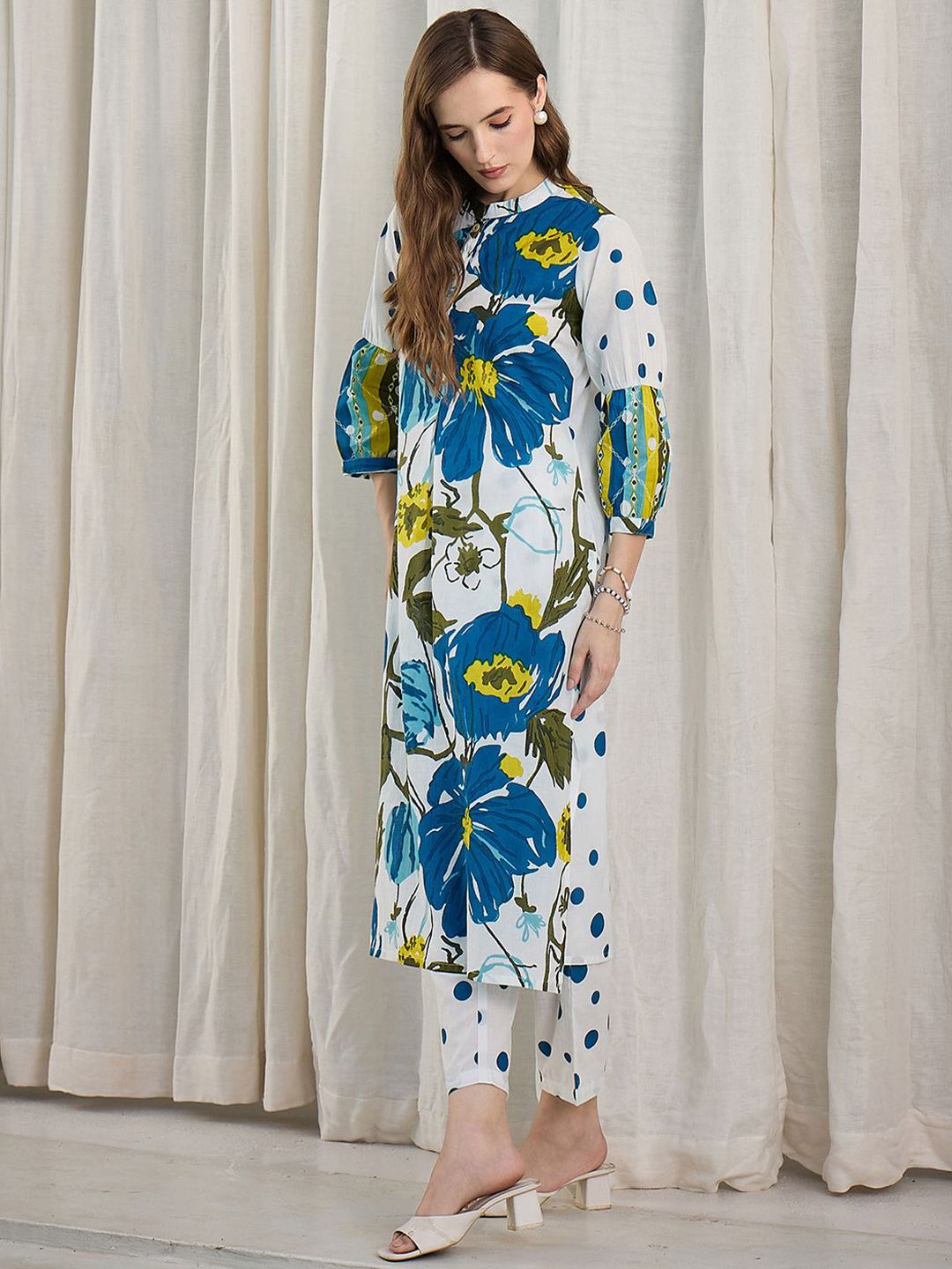 Women Floral Printed Cotton Kurta with Trousers
