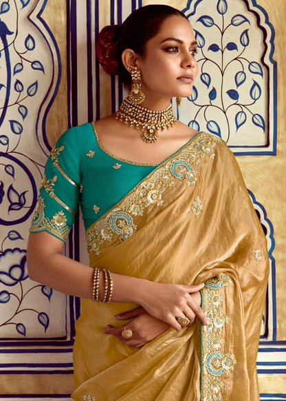 Dhiyona KM Women Golden Designer Silk Saree With Rich Zari Embroidery