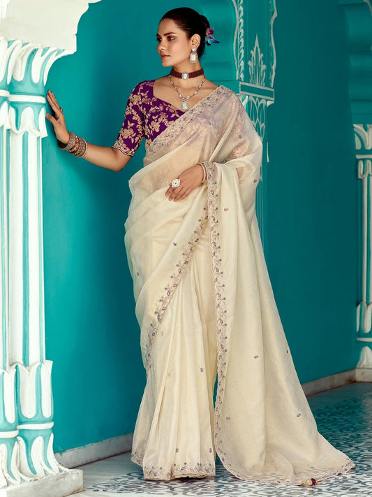 Dhiyona KM Women Cream Tissue Silk Saree With Sequins Work & Purple Contrast Blouse