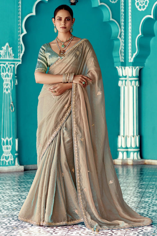 Dhiyona KM Women Beige Embroidery Tissue Silk Saree With Sea Green Blouse