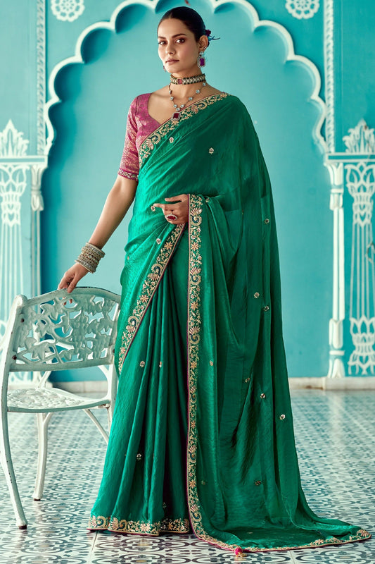 Dhiyona KM Women Green Embroidery Pure Tissue Silk Saree With Red Blouse & Crush Fabric